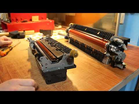 Видео: Как заменить пленку прижимного вала печки (Fuser Film Sleeve) Xerox DocuColor