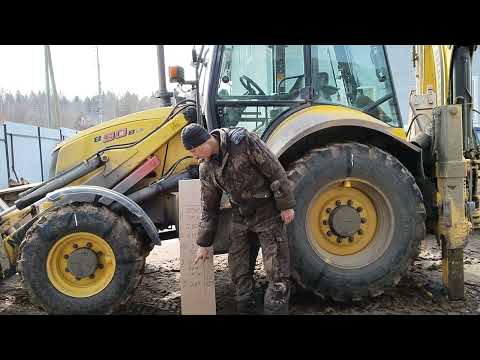 Видео: Экскаватор погрузчик. Забегание колёс - просчёт инженеров или так задумано?