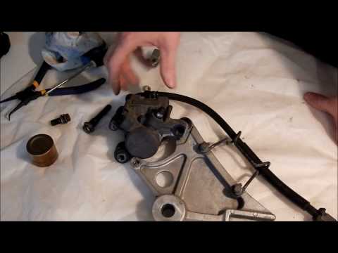 Видео: Задний суппорт CB 400 разборка, дефектовка, тюнинг.