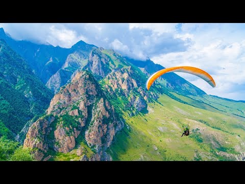 Видео: Полет на параплане в горах Красной Поляны