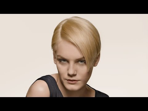 Видео: Креативная ассиметричная стрижка с коротким затылком