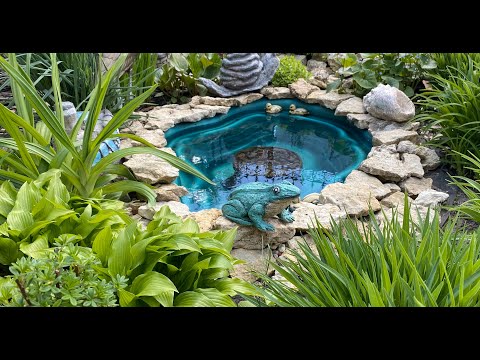 Видео: Чищу пруд после зимы. Поделки из цемента вокруг прудика.