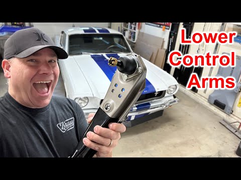 Видео: Как заменить нижний рычаг подвески — Classic Mustang