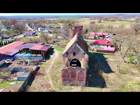 Видео: Кирха Куменена с аистами