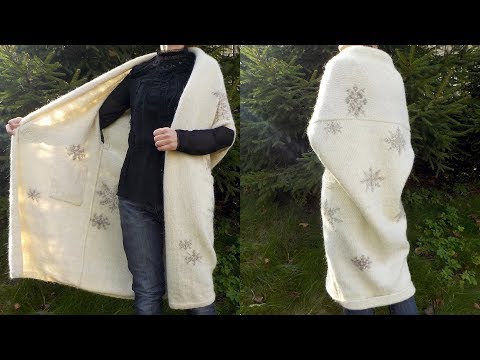 Видео: Вышивка по петлям на вязаном полотне