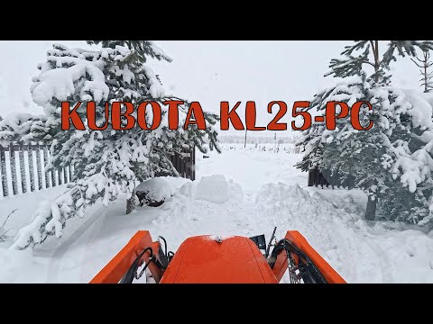Видео: Пробиваю дорогу зимой KUBOTA KL25 PC