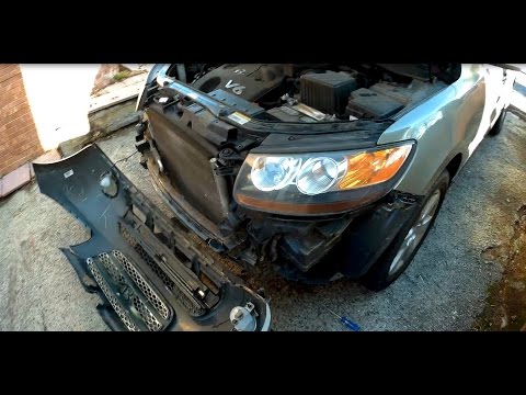 Видео: Как снять и установить накладку переднего бампера Hyundai Santa Fe