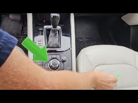 Видео: Снять модуль управления центральной консолью Mazda CX5 2016–18 гг.