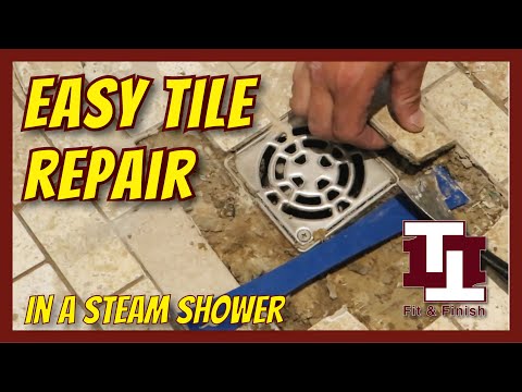 Видео: Ремонт плитки на полу в паровой душевой