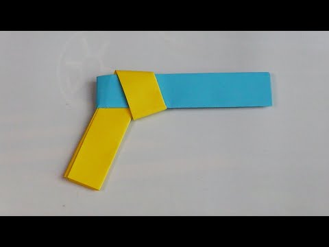 Видео: Оригами пистолет Как сделать оружие из бумаги // Origami gun How to make a weapon out of paper