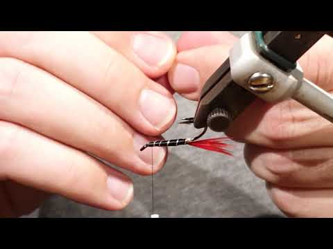 Видео: Молчаливый вязальщик. Нахлыстовая мушка Dovey.