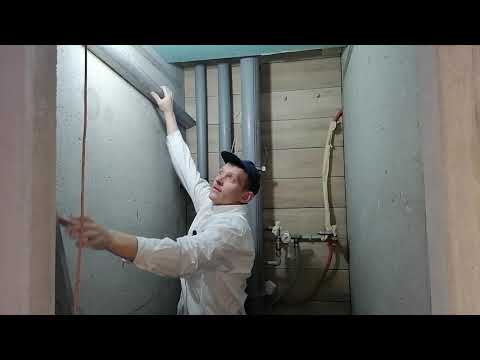 Видео: Как быстро выровнять стену плиточным клеем под плитку. Штукатурка бетонной стены плиточным клеем.