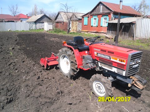 Видео: Особенности Японского минитрактора