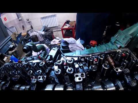 Видео: Вольво FMX D13 Газы в системе охлаждения. Замена стаканчиков под форсунки!