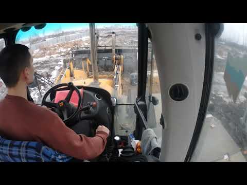 Видео: Работа на Экскаватор - погрузчике JCB