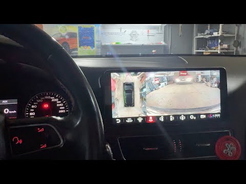 Видео: Audi Q5 ⎮ Замена штатной магнитолы MMI, установка кругового обзора, камер 360, беспроводной зарядки