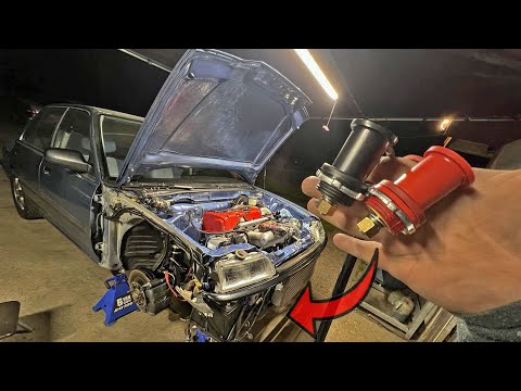 Видео: Перенос аккумулятора на K20 EF Sedan с зарядным постом!