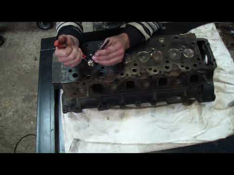 Видео: Ремонт головки блока 4HF1, 4HG1.