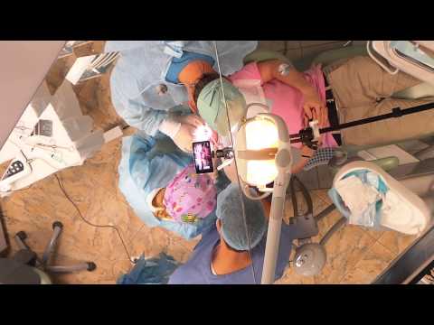 Видео: Удаление кисты хирургическим путем.