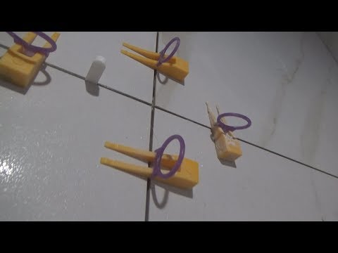 Видео: Ускоряет ли укладку плитки СВП система  3д крестики? Ремонт ванной.