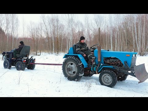 Видео: Кто кого?  Битва минитракторов.