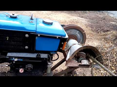 Видео: Шнековий щепоріз на мототракторі 12 кс