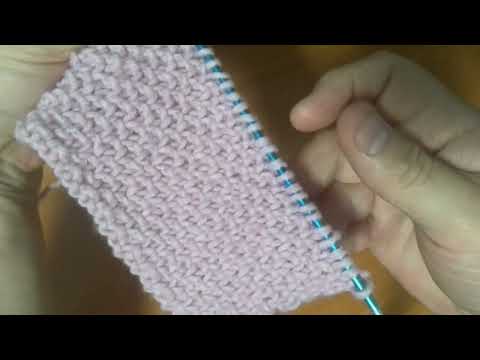Видео: Рельефный узор спицами похож на узор рис