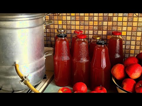 Видео: Яблочный сок в соковарке/Яблочный сок на зиму/ Закрутка сока