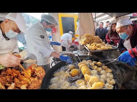 Видео: Большие блины, заворачивающие любую еду на ярмарке в Тяньцзине