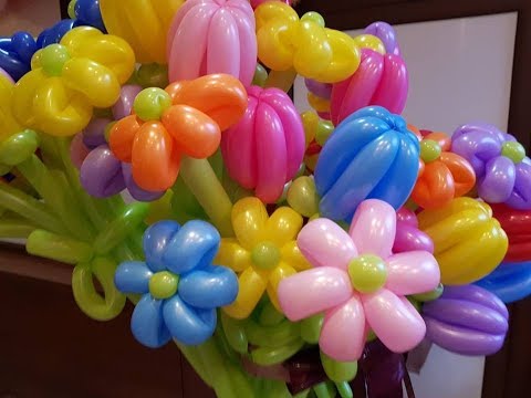 Видео: Как се прави цвете от балони в два цвята