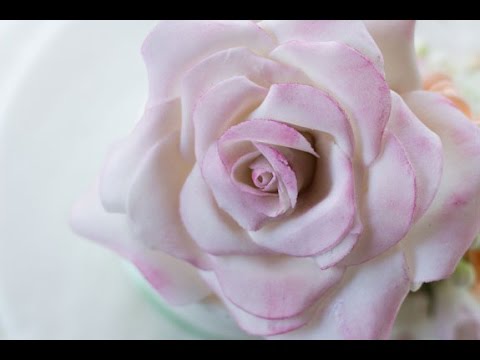 Видео: Как сделать розу из мастики