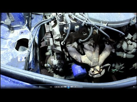 Видео: Замена ремня и ролика ГРМ на Renault Logan 1,4 Рено Логан 2006 года