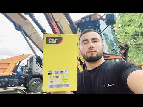 Видео: Caterpillar 428E замена масла в АКПП фильтр Экскаватор-погрузчик  Caterpillar #jcb #terex #cat