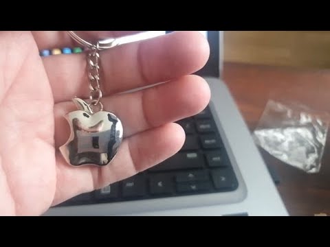 Видео: Отзыв о брелках на ключи с AliExpress. Apple и домик металлические.