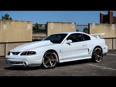 Видео: Являются ли модели Cobra svt 1996–1998 годов лучшими подержанными Mustang для пробега в 10 тыс. к...
