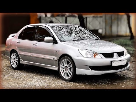 Видео: Как снять генератор с Митсубиши Лансер 9