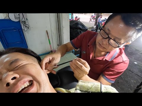 Видео: Чистка ушей в Лаосе