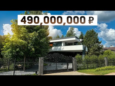 Видео: Обзор дома-лайнера 706 м2 в стиле минимализм с эксплуатируемой плоской кровлей в Гринфилде