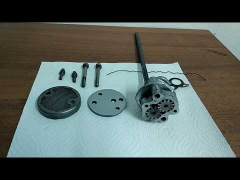 Видео: Разборка мотоцикла Урал. Часть 5. Масляный насос.