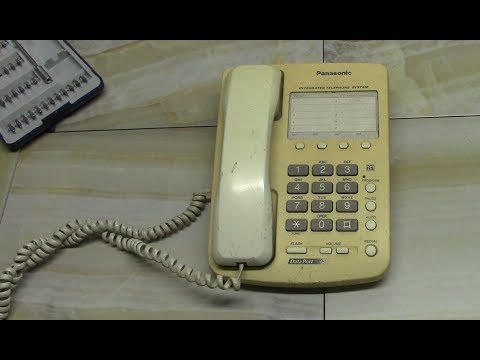 Видео: Разбираем телефон Panasonic.