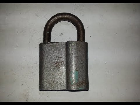 Видео: Ремонт навесного замка. Меняем секрет / Repair of a padlock.  We change the secret