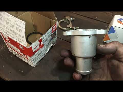 Видео: Замена корпуса термостата (термостата) на Рено Логан/ Сандеро 1.4