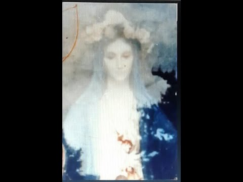 Видео: Явления Божией Матери в небе и на земле , отображённые на фото .