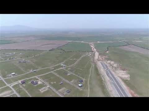 Видео: Строительство продолжения Кунаева со стороны микрорайона САУЛЕ
