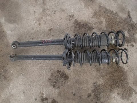 Видео: Замена задних стоек и пружин на Mazda Demio