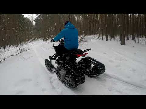 Видео: Гусеницы на квадроцикл зимой
