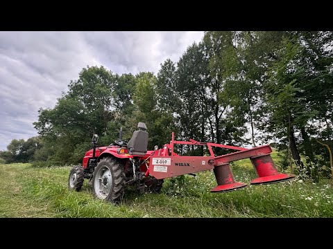 Видео: Кошу роторною косаркою траву в лузі на сіно для корів.