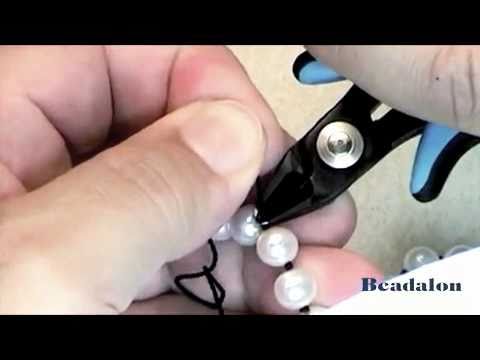 Видео: Завершение завязанной нити жемчуга