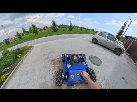 Видео: Газонокосилка с пультом управления OM 1