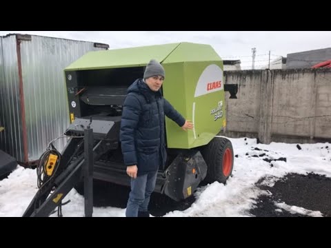 Видео: Обзор прессподборщика клас claas rollant 340